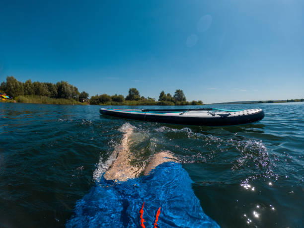 istock Floating in Clear Water with Paddleboard 2172789223