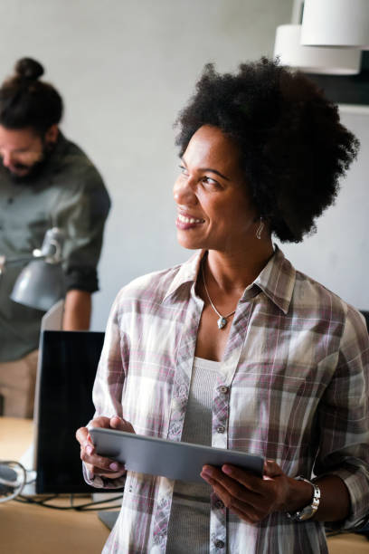 istock Success black woman with tablet, analytics and developer for startup business website IT software 2172798603