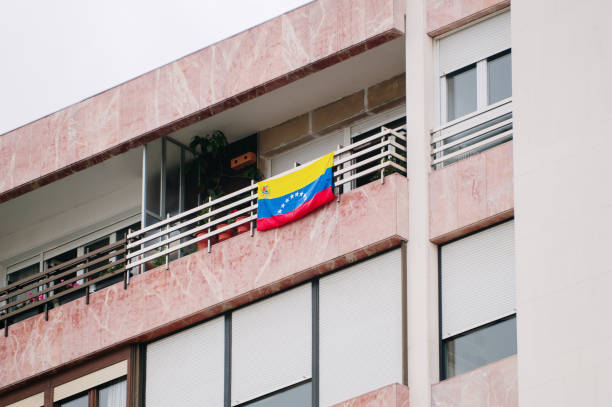 Venezuelan flag hanging on a building facade