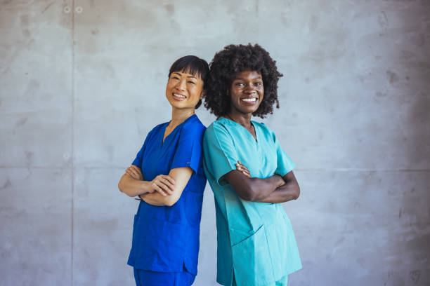 istock Confident Nurses Smiling Together in Medical Uniform 2172801893