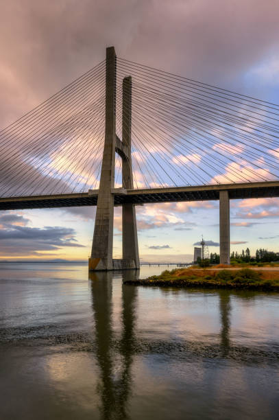 istock bridge in Lisabon at sunrise 2172802750