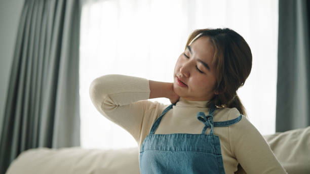 istock Housekeeper having a neck shoulder pain. 2172806104