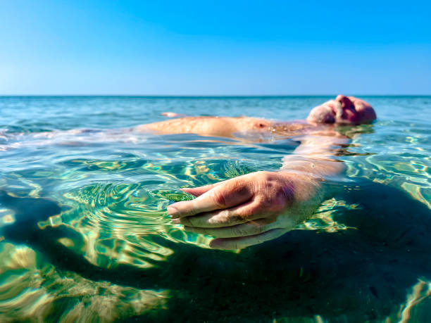 istock Floating peacefully in the green and blue water 2172806512