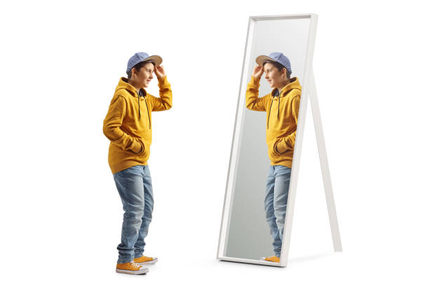 istock Teenage boy standing in front of a mirror 2172807864