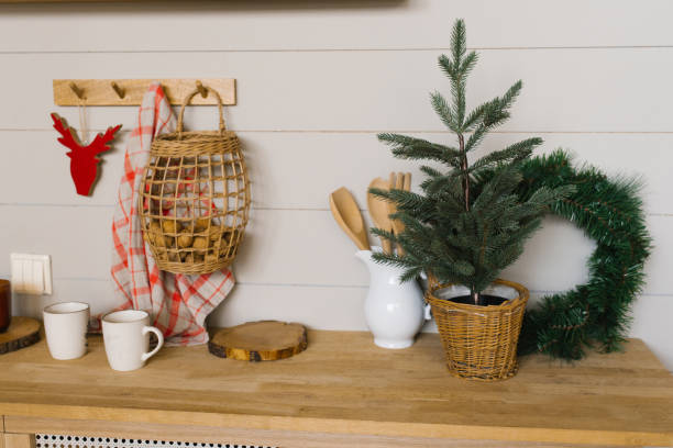 istock Christmas kitchen, wreath, mugs dishes in Scandinavian style 2172809955
