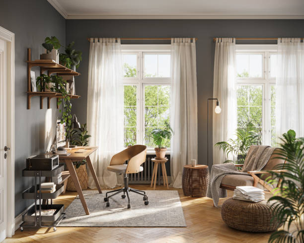 istock Digitally Rendered Bright Home Office with Cozy Seating Area and Large Windows 2172810256