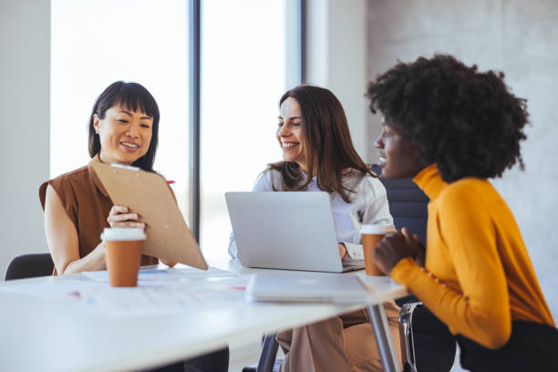 istock Diverse Business Team Collaborating in Modern Office Environment 2172815846