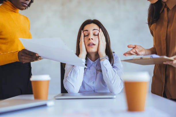 Stressed Businesswoman Overwhelmed with Office Workload