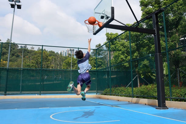 istock Kids are playing basketball 2172815892
