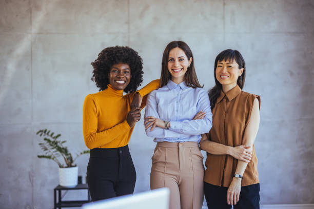 istock Confident Diverse Women Posing in Office Setting Together 2172815908