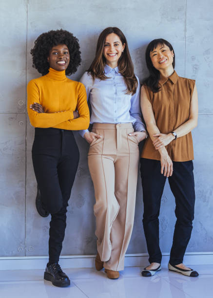 istock Confident Women Standing Together in Modern Office Setting 2172815921
