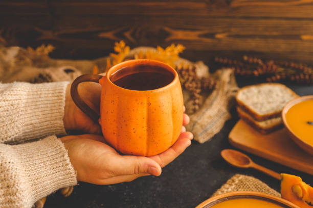 istock Cup of tea in hands, autumn mood 2172817476