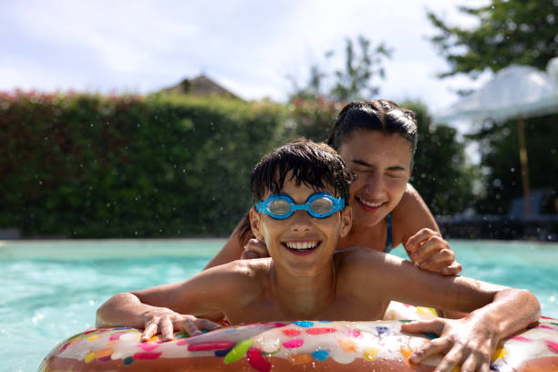 istock Brother And Sister Pool Fun 2172817827