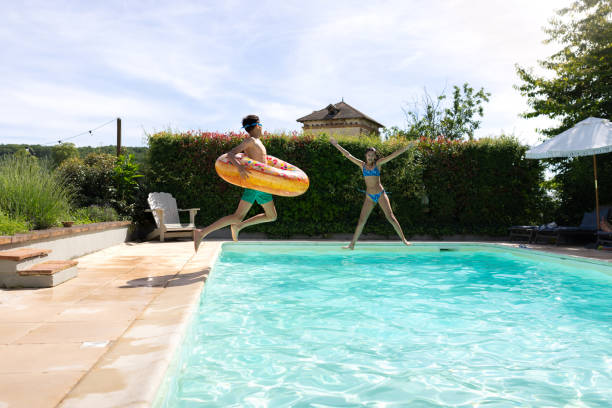 istock Seeing Who Can Jump The Furthest 2172818092