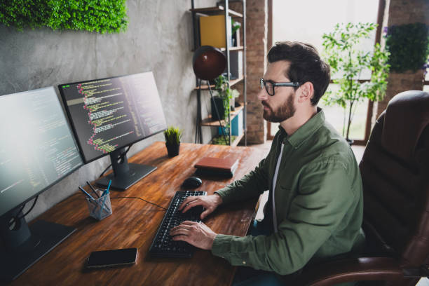 istock Photo of intelligent man hardware expert wear shirt work with operating system server pc cyber space indoors 2172820690