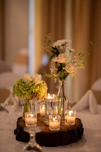 istock Floral table decoration in a wedding hall with candles 2172827266