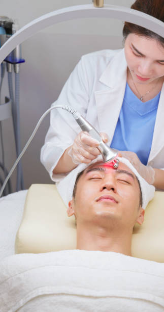 istock asian beauticians use beauty device 2172828414