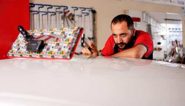 istock Repairing Dents On Car Body 2172832948