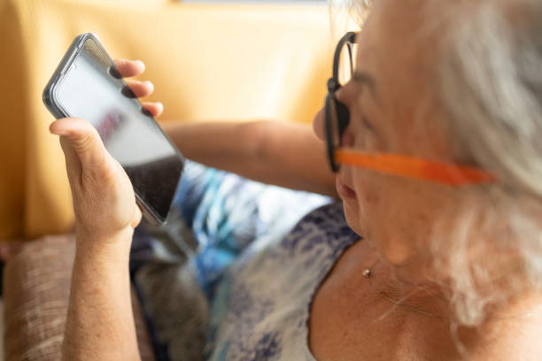 istock Senior woman browsing smartphone screen 2172838522