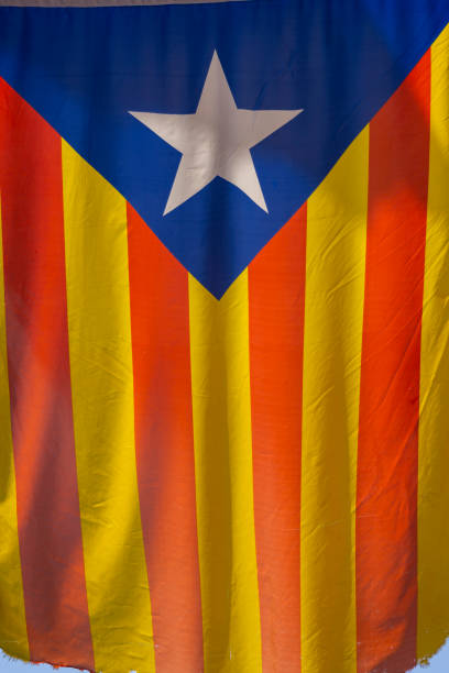 Catalan flag hanging between houses