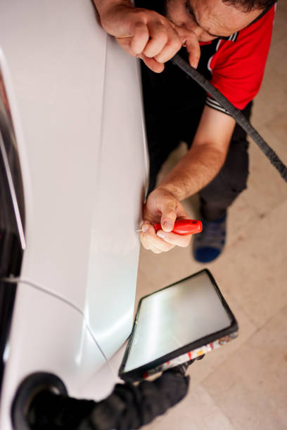 istock Repairing Dents On Car Body 2172844998