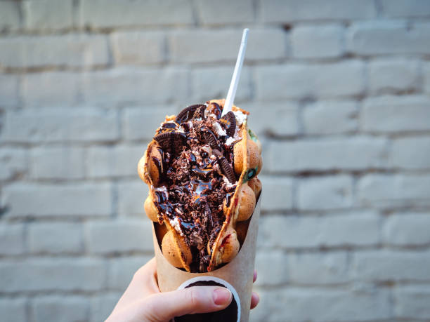 istock Hong Kong waffles or bubble wafer in hand 2172847819
