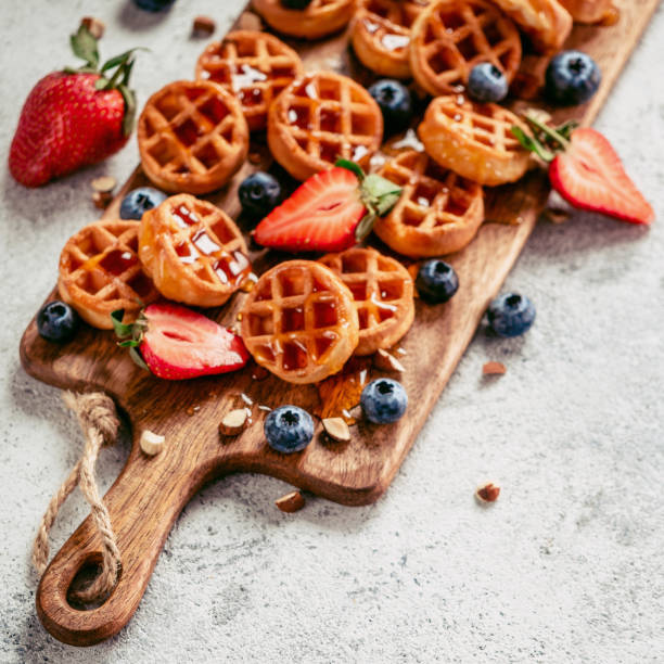 Delicious belgian waffles with berries, copy space