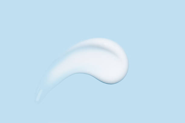 istock Cream gel balm cosmetic texture smudge on pastel blue background 2172850114