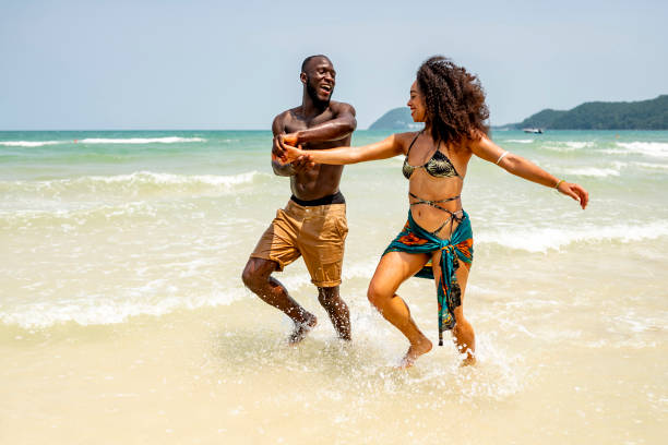 istock Joyful Couple Enjoying a Fun Day at the Beach 2172851667