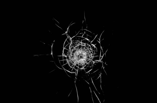 istock Texture of broken glass on a black background 2172856113