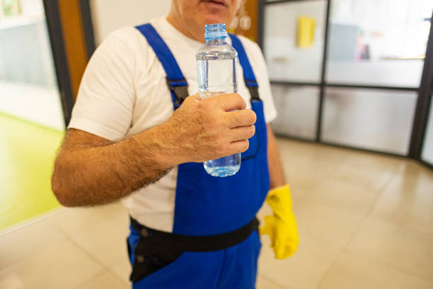 istock Senior custodian drinking water on a break 2172863606