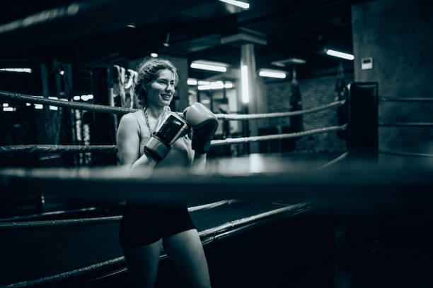 istock Boxer in the ring focusing on her next move 2172864401