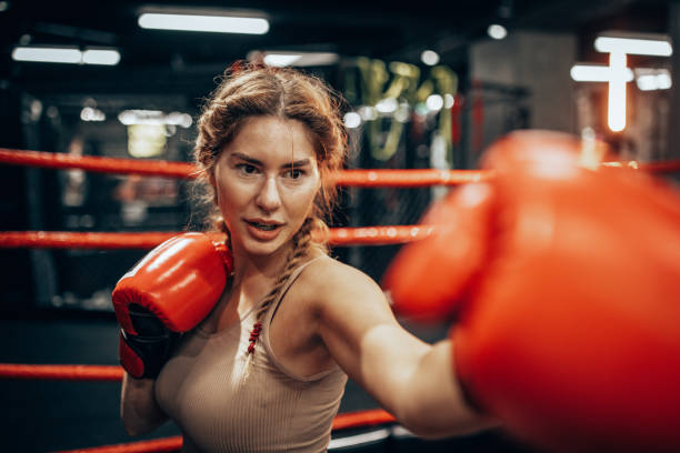 istock Confident boxer showing determination in the ring 2172868945