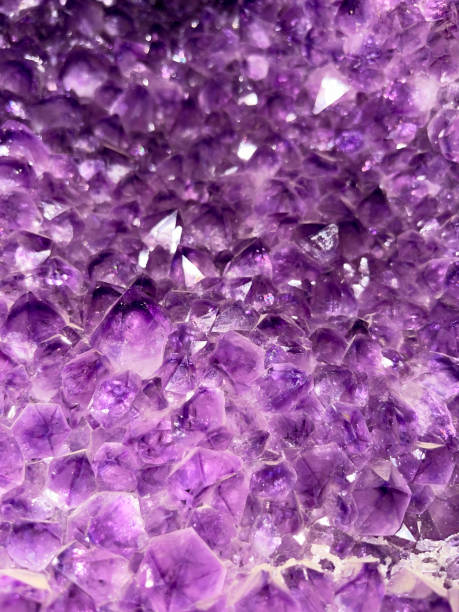istock Texture of natural amethyst crystals. Natural background. 2172873378