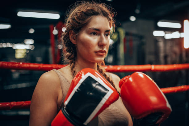 istock Young boxer showing focus and discipline in training 2172879593