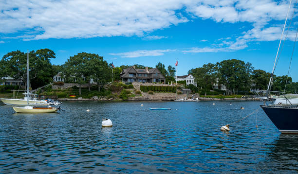 Views of luxury homes found along the CT coast in the area of Rowayton, CT.  Many of the homes are built along the various water inlets from Long Island Sound and have wonderful views of the seas.  Some even appear on assorted islands just off the coast.  Many of these homes have their own dock facilities as boating is a popular activity in this region.  Rowayton is a coastal village in the City of Norwalk, about 40 miles from New York City.
