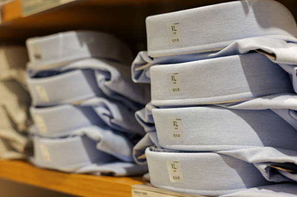 Men's Shirt Stacked Neatly Placed on Shelves