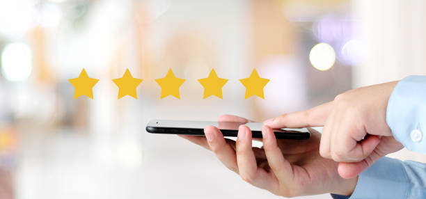 istock Customer Experience, A user give excellent rating to product and service experience on online application, Customer review for satisfaction feedback, Customer evaluate quality of service and product 2172882296