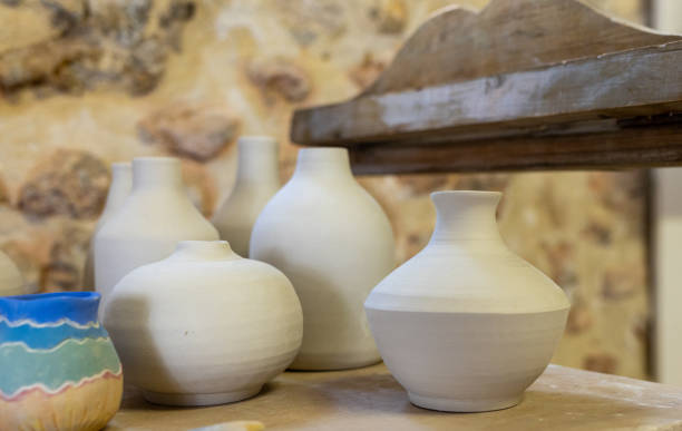 istock blanks of clay pots and vases, ceramic workshop, handmade ceramic products 2172882298