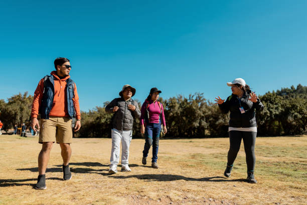 istock Tour guide woman talking with tourists in Cusco, Peru 2172883265