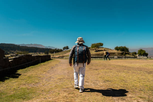 Mature traveler man walking on Cusco, Peru