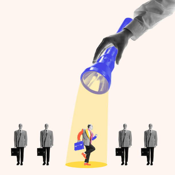 istock Large hand holding flashlight highlighting unique candidate among other people, emphasizing importance of standing out in hiring process. Contemporary art collage. 2172889161
