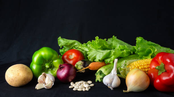 istock Fresh organic vegetables on a black fabric background 2172891180