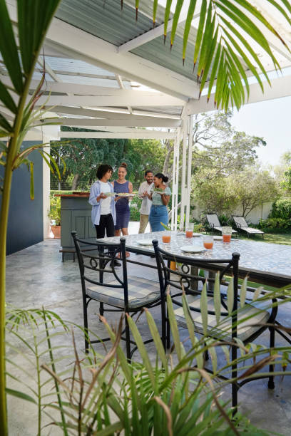 istock Smiling fiends on patio 2172895063