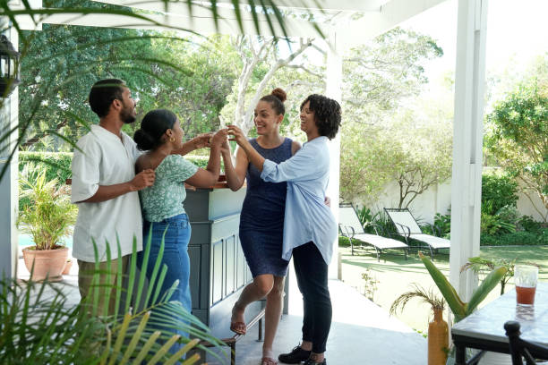 istock Smiling fiends toasting with shots in garden 2172895239