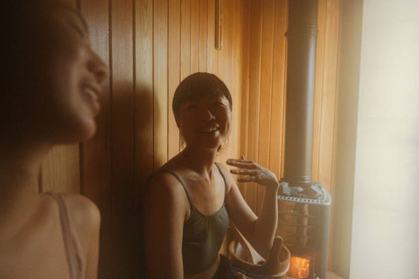 Photo of friends relaxing in a sauna.