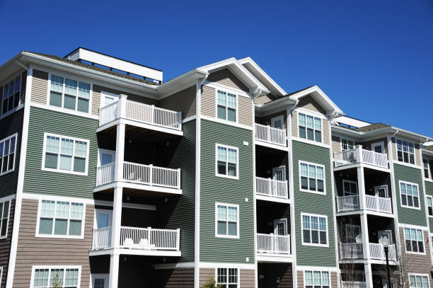 istock Close up on modern apartment building with blue sky 2172898907