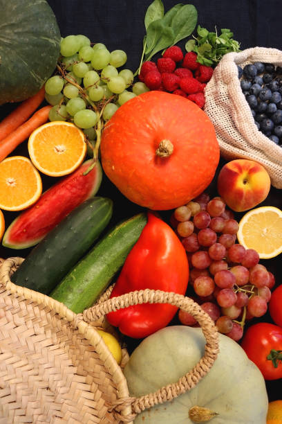 istock Straw Bag And Healthy Produce On Dark Background 2172903112
