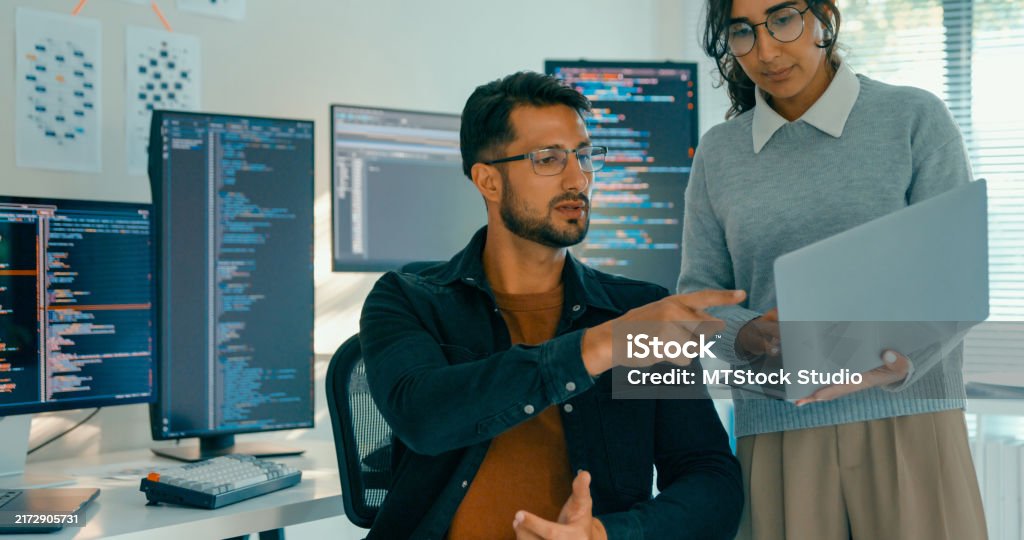 Software Engineering Team Engaged In Problemsolving And Code Analysis ...