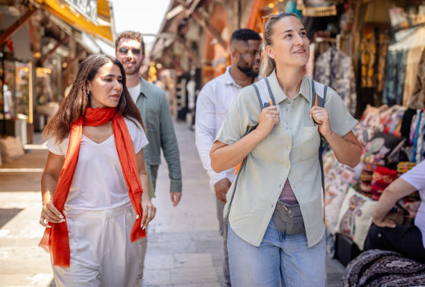 istock Joyful walk through lively historic market streets 2172907231